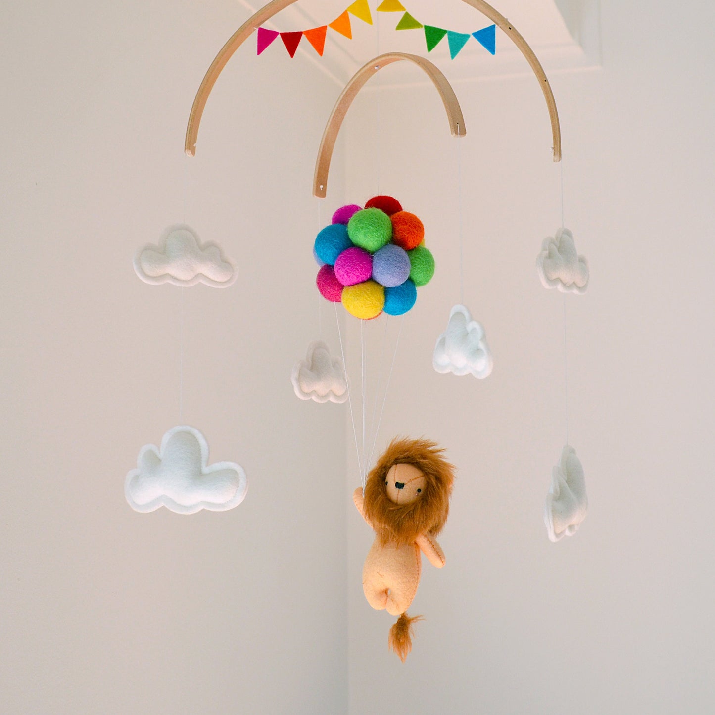 Lion with bright Rainbow Balloons