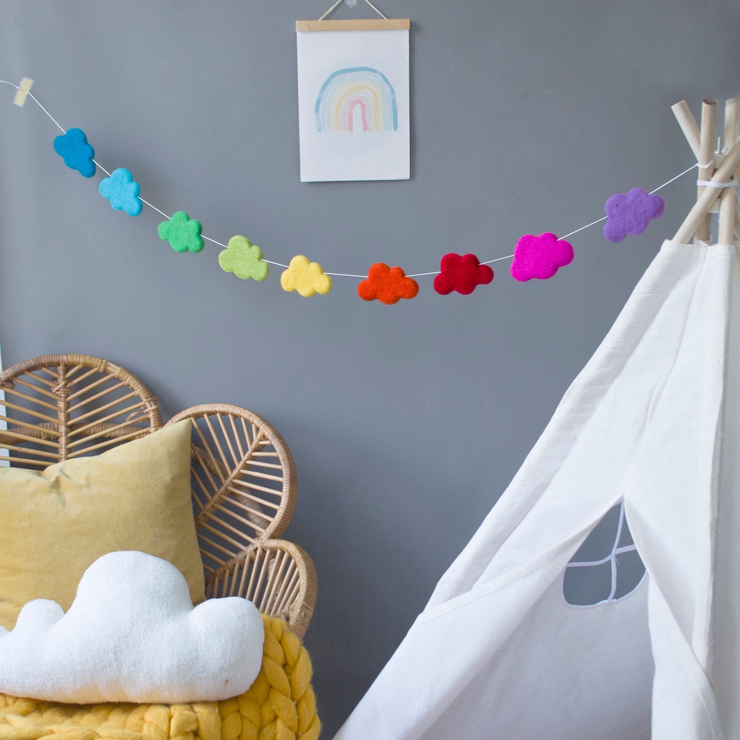 Rainbow garland with clouds in bright colours